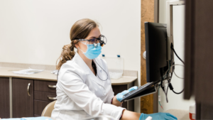 Dr. Bright Reviewing Patient Info