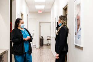 staff members talking
